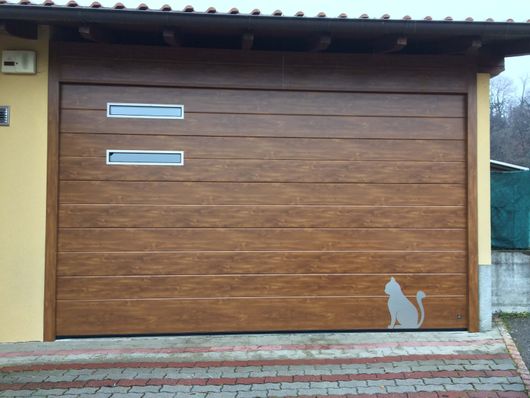 porte sezionali per garage in legno e alluminio